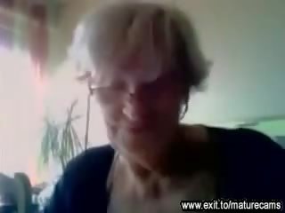 55 years old granny shows her big tits on cam Video